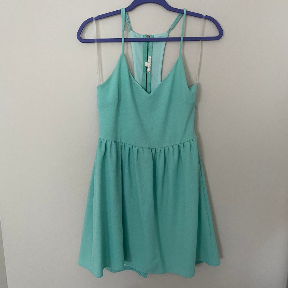 mint green dress with cutout back